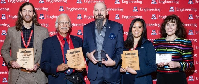 Scott Sayles (center) with his Bear Down Award at the 2023 Homecoming Engineers Breakfast.