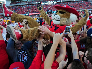 Wilbur Wildcat in crowd of people