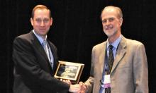 Jim Lozier accepts the 2016 Water Quality Person of the Year award from the American Membrane Technology Association and American Water Works Association. Photo courtesy of AMTA and AWWA.