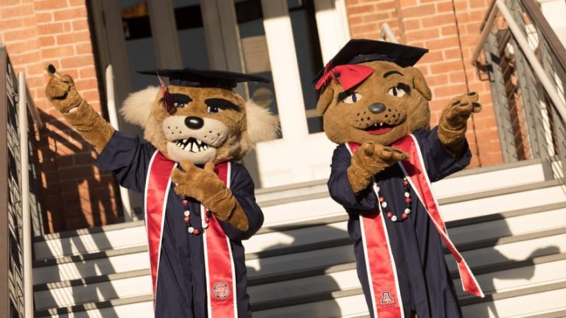 Wilbur and Wilma mascot in graduation regalia
